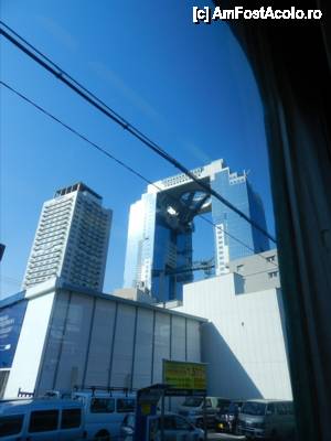 [P05] Umeda Sky Building, cu al ei Floating Garden Observatory, vazuta din tren. Se afla in apropiere de Gara Osaka.  » foto by TraianS
 - 
<span class="allrVoted glyphicon glyphicon-heart hidden" id="av413662"></span>
<a class="m-l-10 hidden" id="sv413662" onclick="voting_Foto_DelVot(,413662,2490)" role="button">șterge vot <span class="glyphicon glyphicon-remove"></span></a>
<a id="v9413662" class=" c-red"  onclick="voting_Foto_SetVot(413662)" role="button"><span class="glyphicon glyphicon-heart-empty"></span> <b>LIKE</b> = Votează poza</a> <img class="hidden"  id="f413662W9" src="/imagini/loader.gif" border="0" /><span class="AjErrMes hidden" id="e413662ErM"></span>