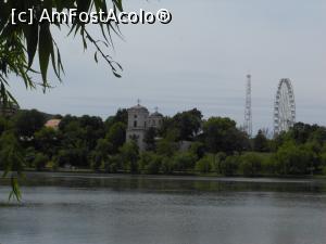 [P08] București - Parcul Plumbuita. Pe celălalt mal al lacului, Biserica Teiul Doamnei Ghika și Roata mare din Parcul Tei. » foto by iulianic
 - 
<span class="allrVoted glyphicon glyphicon-heart hidden" id="av1366960"></span>
<a class="m-l-10 hidden" id="sv1366960" onclick="voting_Foto_DelVot(,1366960,11447)" role="button">șterge vot <span class="glyphicon glyphicon-remove"></span></a>
<a id="v91366960" class=" c-red"  onclick="voting_Foto_SetVot(1366960)" role="button"><span class="glyphicon glyphicon-heart-empty"></span> <b>LIKE</b> = Votează poza</a> <img class="hidden"  id="f1366960W9" src="/imagini/loader.gif" border="0" /><span class="AjErrMes hidden" id="e1366960ErM"></span>