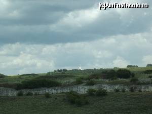 [P52] La plecare, se observă în depărtare monumentul Tropaeum Traiani iar în faţă zidurile de apărare ale cetăţii Tropaeum Traiani » foto by irinad
 - 
<span class="allrVoted glyphicon glyphicon-heart hidden" id="av655821"></span>
<a class="m-l-10 hidden" id="sv655821" onclick="voting_Foto_DelVot(,655821,20825)" role="button">șterge vot <span class="glyphicon glyphicon-remove"></span></a>
<a id="v9655821" class=" c-red"  onclick="voting_Foto_SetVot(655821)" role="button"><span class="glyphicon glyphicon-heart-empty"></span> <b>LIKE</b> = Votează poza</a> <img class="hidden"  id="f655821W9" src="/imagini/loader.gif" border="0" /><span class="AjErrMes hidden" id="e655821ErM"></span>