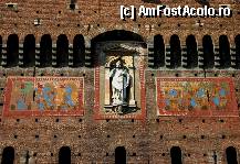 [P18] Milano, Castello Sforzesco: Statuia Sfântului Ambrozie, patronul orașului Milano și stindardele de luptă ale familiilor Visconti și Sforza, vizibile pe fațada Turnului Filarete » foto by mariana.olaru
 - 
<span class="allrVoted glyphicon glyphicon-heart hidden" id="av335600"></span>
<a class="m-l-10 hidden" id="sv335600" onclick="voting_Foto_DelVot(,335600,27191)" role="button">șterge vot <span class="glyphicon glyphicon-remove"></span></a>
<a id="v9335600" class=" c-red"  onclick="voting_Foto_SetVot(335600)" role="button"><span class="glyphicon glyphicon-heart-empty"></span> <b>LIKE</b> = Votează poza</a> <img class="hidden"  id="f335600W9" src="/imagini/loader.gif" border="0" /><span class="AjErrMes hidden" id="e335600ErM"></span>